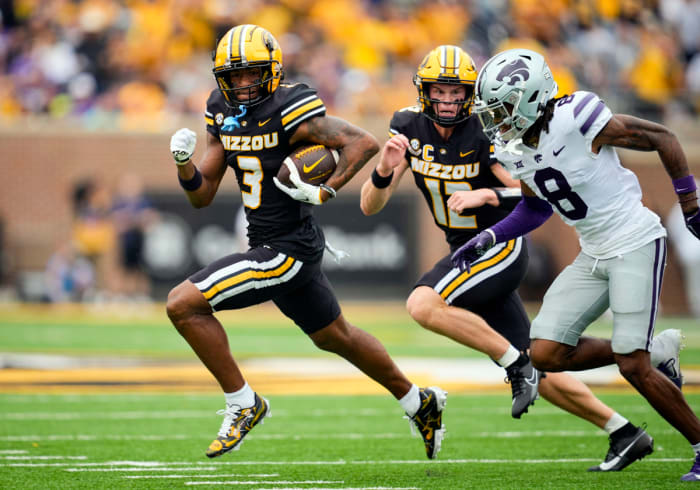 Sep 16, 2023; Columbia, Missouri, USA; Missouri Tigers wide receiver Luther Burden III (3) runs with the ball against Kansas State Wildcats cornerback Will Lee III (8) during the first half at Faurot Field at Memorial Stadium.